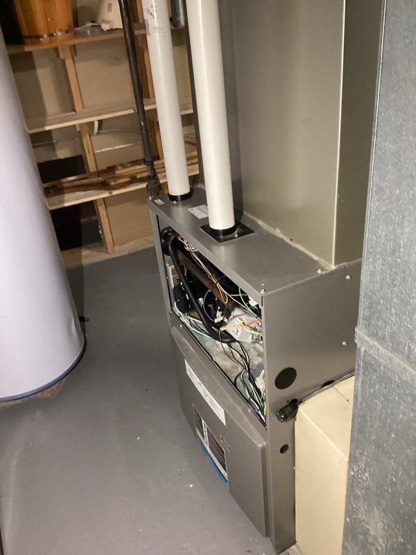 Responded to gas leak call after utility company visit and identified defective gas valve requiring replacement. Accessed furnace unit, inspected gas line connections and valve assembly, and documented equipment condition and gas piping configuration for repair estimate and parts ordering.