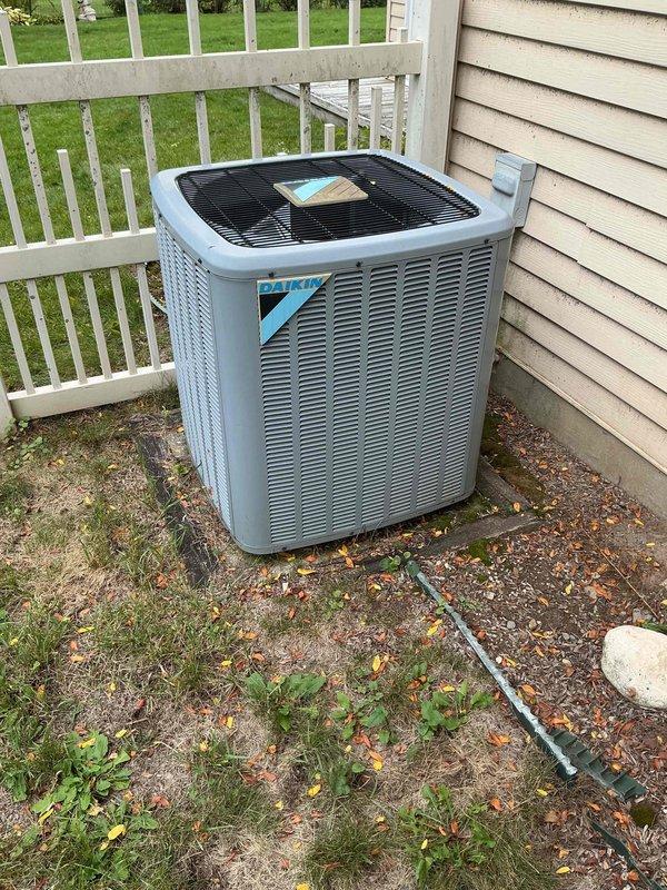 Completed annual AC tune-up on 8-year-old cooling system with no reported issues. Performed comprehensive inspection of outdoor condenser unit, verified proper refrigerant pressures using manifold gauges, checked electrical connections and conduit, and confirmed system operation. All components functioning within normal parameters; 2-year-old furnace and thermostat also operating properly with no service required at this time.