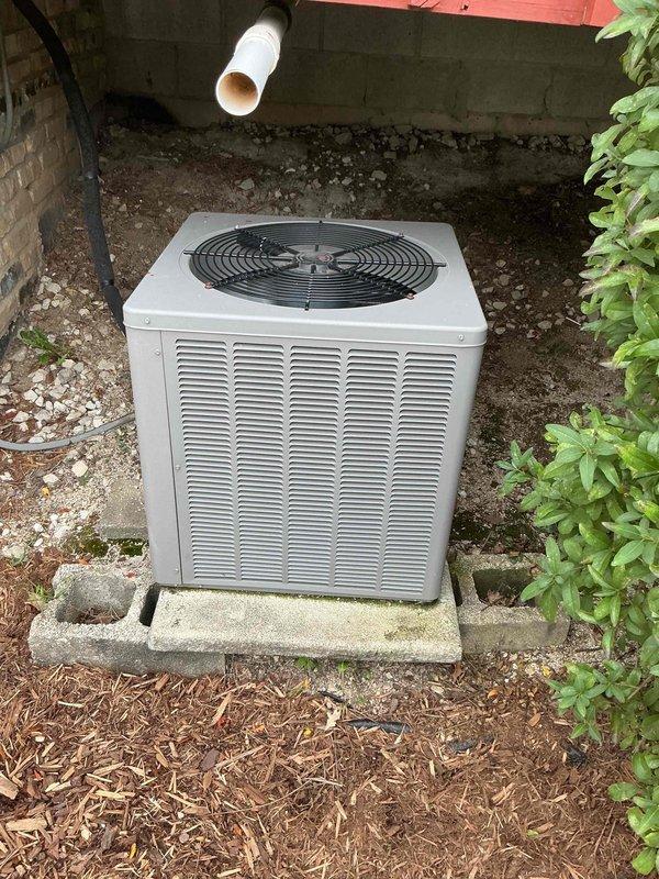 Completed routine cooling season maintenance visit per membership agreement. Performed comprehensive AC tune-up on outdoor condenser unit, including visual inspection revealing moderate rust staining and corrosion on exterior panels. Conducted electrical diagnostics using digital multimeter to verify proper system operation and measure voltage/amperage at service ports. Inspected all accessible components including fan assembly, louvered panels for adequate airflow, and condensate drainage line. Unit operational and functioning within normal parameters upon completion of scheduled preventive maintenance.
