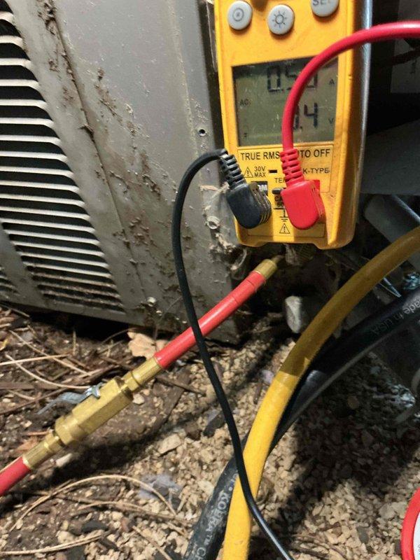 Completed routine cooling season maintenance visit per membership agreement. Performed comprehensive AC tune-up on outdoor condenser unit, including visual inspection revealing moderate rust staining and corrosion on exterior panels. Conducted electrical diagnostics using digital multimeter to verify proper system operation and measure voltage/amperage at service ports. Inspected all accessible components including fan assembly, louvered panels for adequate airflow, and condensate drainage line. Unit operational and functioning within normal parameters upon completion of scheduled preventive maintenance.