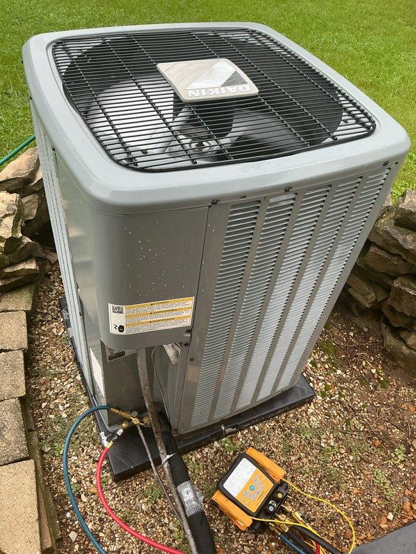 Performed comprehensive tune-up on residential Armstrong Air furnace and Nutone air conditioning system. Conducted visual inspection of both units, verified proper installation and component condition, tested refrigerant pressures using manifold gauges, and confirmed all safety labels and specifications were intact. Both indoor and outdoor units showed no signs of deterioration and were operating within normal parameters.