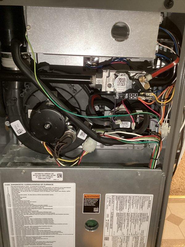 Completed comprehensive furnace and air conditioning tune-up maintenance service. Performed thorough inspection of furnace interior components including blower motor assembly, gas valve, electrical connections, and wiring harnesses. All diagnostic codes reviewed and system status verified as operational. Temperature readings taken at supply air duct confirmed proper heating performance. Provided replacement furnace filter and discussed membership program options with customer.