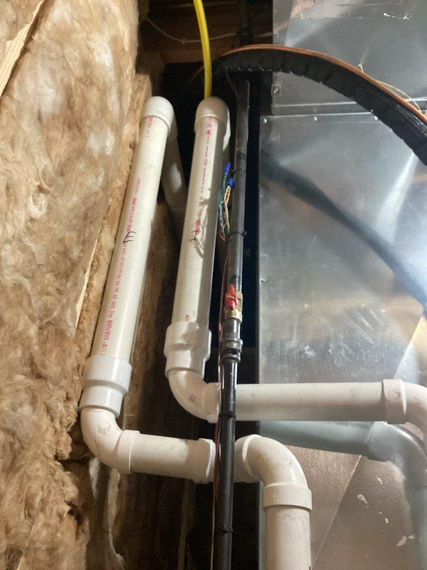 Completed furnace tune-up and system inspection on residential HVAC unit. Performed comprehensive maintenance including visual inspection of internal components, blower motor assembly, and electrical connections with furnace access panel opened for thorough examination. Verified proper operation of condensate drain system and PVC venting configuration, checked all mechanical components for wear and proper function, and confirmed system is operating within manufacturer specifications.