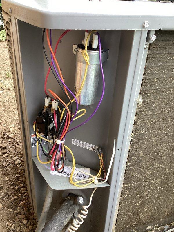 Performed routine maintenance on outdoor AC condensing unit. Inspected electrical disconnect box, verified capacitor condition and all wire connections secure. Noted heavy dirt and debris accumulation on condenser coil fins, which was reducing system efficiency and airflow. Cleaned condenser coils to restore proper heat transfer and optimal unit performance.