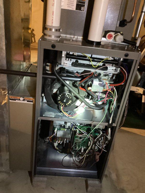 Completed comprehensive seasonal tune-up on residential gas furnace and air conditioning system. Performed full system inspection with furnace cabinet access to examine internal components, blower assembly, heat exchanger, and control boards; verified all electrical connections and safety controls operational. Conducted refrigerant pressure testing on outdoor condensing unit using manifold gauges to confirm proper system charge and performance parameters within manufacturer specifications.