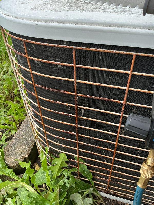 Completed routine A/C tune-up and maintenance inspection as part of prepaid membership service. Performed system diagnostics on outdoor condensing unit, including electrical testing with clamp meter to verify proper amperage draw and capacitor functionality. Inspected unit condition, noting rust and corrosion on protective grille and accumulated debris on condenser coils, though system operational parameters remained within acceptable limits for continued service.