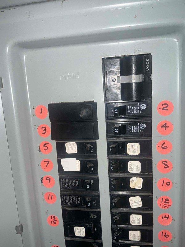 Responded to emergency service call for 21-year-old air conditioning system requiring replacement estimate. Evaluated existing natural gas furnace in basement, which was previously installed by our company within the last 10 years and remains in good operating condition. Documented electrical panel configuration and circuit breaker layout, photographing the 200-amp main service panel with numbered circuit identification system to assess compatibility requirements for new AC equipment installation. Provided comprehensive replacement estimate for aging air conditioning unit while confirming furnace system does not require replacement at this time.
