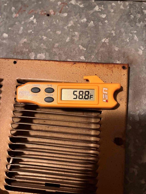Completed furnace tune-up and air conditioning tune-up on residential HVAC system. Performed comprehensive diagnostics including temperature measurements of heat exchanger components registering 588°F and electrical testing showing 3769 microfarads capacitance reading using calibrated multimeter. Inspected all system components, verified proper operation of both heating and cooling units, and documented equipment conditions through thermal and electrical analysis.