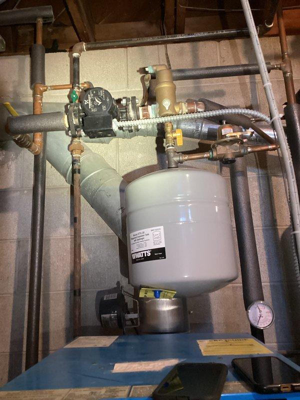 Completed comprehensive tune-up on hydronic heating system with gas-fired boiler. Performed thorough inspection of burner assembly, heat exchanger tubes, circulator pump, expansion tank, and associated piping components. Verified proper operation of all safety controls, checked system pressures, and confirmed adequate water flow throughout the heating loop. All components found to be functioning within normal parameters with no immediate repairs required.