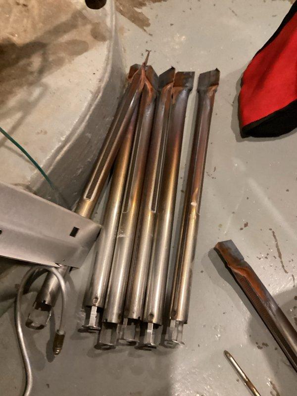 Performed comprehensive tune-up and maintenance on mid-efficiency chimney-vented boiler system. Disassembled, cleaned, and inspected burner assembly tubes and components, removing carbon deposits and verifying proper combustion chamber condition. Reassembled system, tested all safety controls, verified proper venting operation, and confirmed efficient heating system performance upon completion.