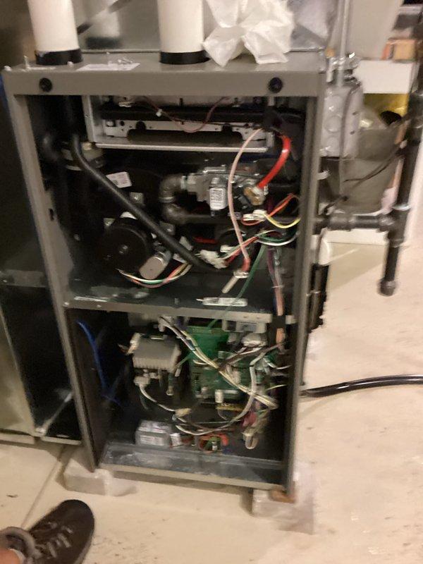 Completed furnace tune-up and safety inspection on residential heating unit. Performed thorough examination of internal components including gas valve, control board, electrical connections, and venting system; secured loose wiring with cable ties to ensure proper organization and prevent potential electrical issues. All components found operating within normal parameters and unit returned to service.