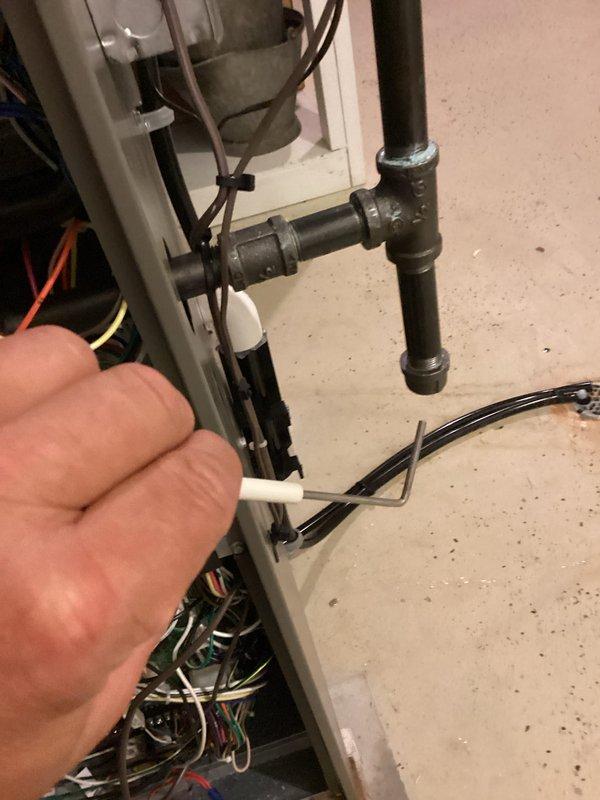 Completed furnace tune-up and safety inspection on residential heating unit. Performed thorough examination of internal components including gas valve, control board, electrical connections, and venting system; secured loose wiring with cable ties to ensure proper organization and prevent potential electrical issues. All components found operating within normal parameters and unit returned to service.