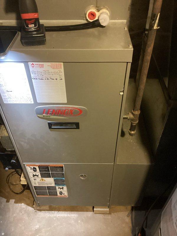 Completed comprehensive tune-up service on Lennox Elite furnace and air conditioning system. Performed temperature diagnostics using calibrated thermometer, recording 74.8°F at system components. Inspected UV light system, verified operational status, and examined ductwork condition. Customer had appropriate AA filter on-site; noted requirement for two Honeywell 16x25x4 filters for future maintenance. All equipment inspected and found operating within normal parameters.