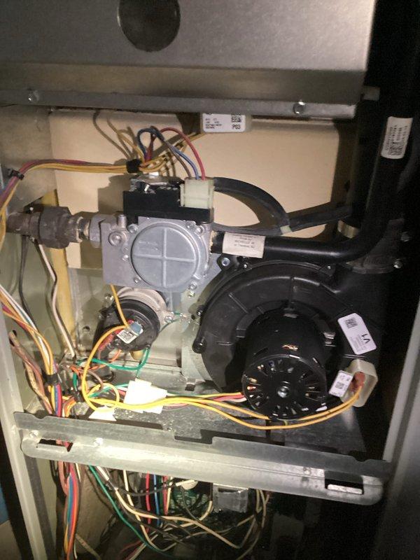 Replaced failed inducer motor on residential gas furnace and performed complete system tune-up. Installed new inducer motor assembly, verified proper draft operation, and tested all safety controls. Completed comprehensive maintenance including inspection of gas valve, burner assembly, blower motor, and all electrical connections. Confirmed system is operating safely and efficiently with proper combustion and airflow.