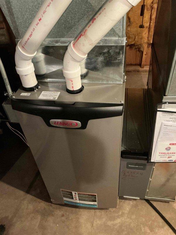 Responded to no heat call on residential Lennox furnace system. Upon arrival, performed diagnostic inspection of unit and associated components. Inspected furnace operation, verified proper venting through PVC exhaust pipes, and checked electrical connections. Examined flame sensor positioning and burner assembly. System evaluated and found to be operating within normal parameters. Verified thermostat communication and confirmed heat cycle completion. Unit restored to full operational status.