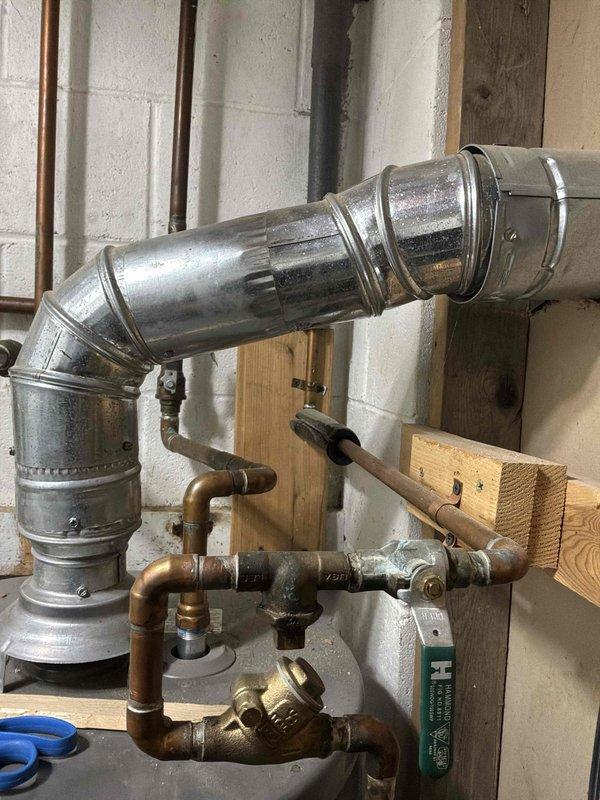 Completed estimate for gas piping installation to service a portable generator. Assessed existing mechanical room infrastructure including copper supply lines, galvanized ductwork, and wall-mounted utility connections. Evaluated generator specifications requiring 1/2" to 3/4" gas line connection with 3/4" quick-connect fitting for safe and compliant natural gas supply to portable unit.