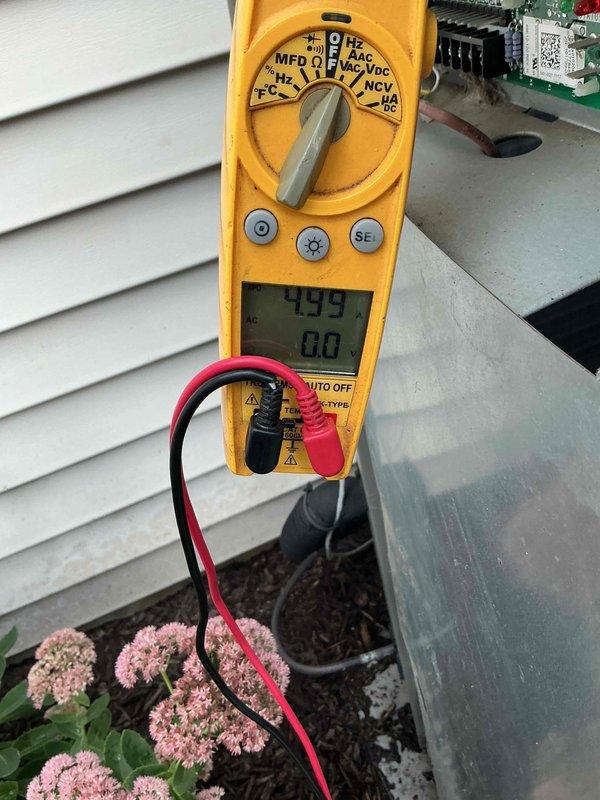 Completed preventive maintenance cooling tune-up on residential air conditioning system as part of recurring membership agreement. Performed comprehensive system inspection, tested electrical components with multimeter showing proper voltage readings, verified operational performance of outdoor condenser unit, and documented equipment condition with photos showing unit operating within normal parameters.