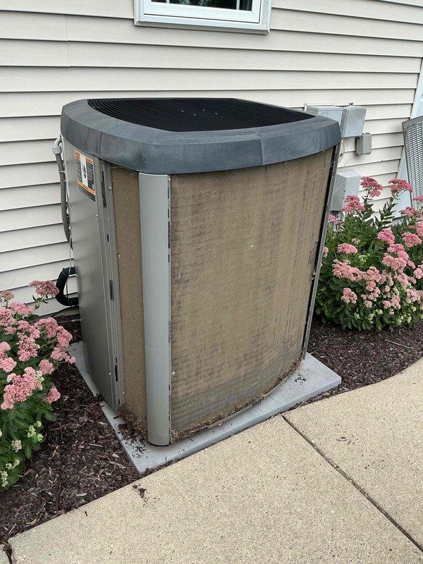 Completed preventive maintenance cooling tune-up on residential air conditioning system as part of recurring membership agreement. Performed comprehensive system inspection, tested electrical components with multimeter showing proper voltage readings, verified operational performance of outdoor condenser unit, and documented equipment condition with photos showing unit operating within normal parameters.