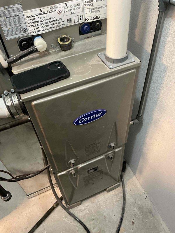 Responded to warranty call for Carrier 59SC5A060M14-12 furnace (Serial: 3825A44692) experiencing short cycling when switching from cooling to heating mode. Upon inspection, diagnosed and resolved heating cycle issue. Unit now operating properly with normal temperature rise within specified range of 45-76°F. Verified all system components functioning correctly and heating cycle completing as designed.