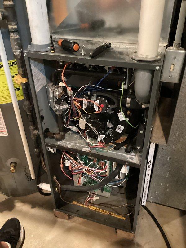 Completed furnace tune-up and air conditioning system inspection. Performed comprehensive evaluation of internal components including gas valve assemblies, control modules, circuit boards, and electrical connections. Inspected blower compartment, heat exchanger assembly, and verified proper wiring connections throughout the system. All components found to be operating within normal parameters and system ready for continued service.