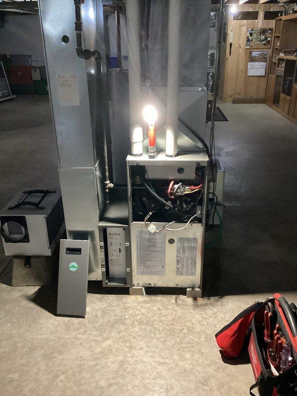Completed furnace tune-up and combustion analysis on natural gas heating system. Performed comprehensive system inspection with access panel removed to evaluate internal components, copper refrigerant lines, and electrical connections. Conducted combustion efficiency testing using calibrated analyzer, which confirmed optimal performance with 96.3% efficiency, oxygen reading of 99%, carbon monoxide at 24 ppm, and carbon dioxide at 6.2%. All readings within manufacturer specifications and safe operating parameters.