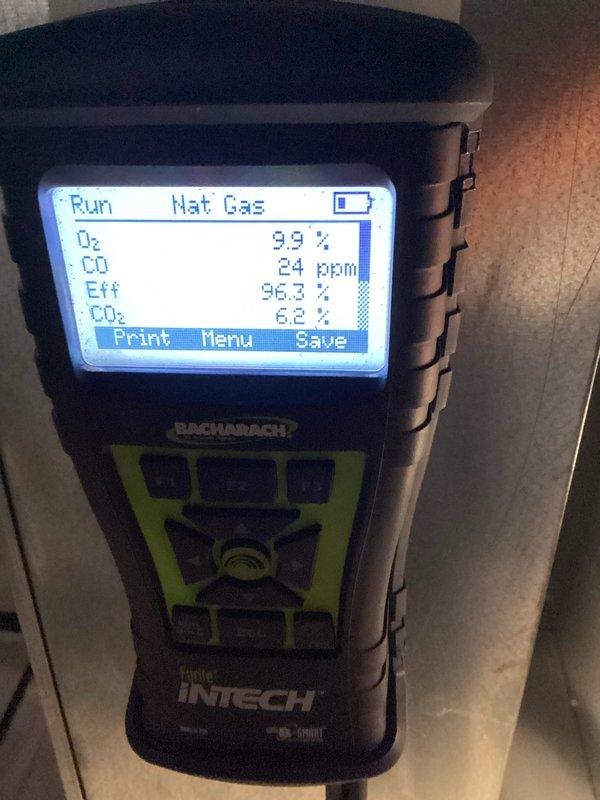 Completed furnace tune-up and combustion analysis on natural gas heating system. Performed comprehensive system inspection with access panel removed to evaluate internal components, copper refrigerant lines, and electrical connections. Conducted combustion efficiency testing using calibrated analyzer, which confirmed optimal performance with 96.3% efficiency, oxygen reading of 99%, carbon monoxide at 24 ppm, and carbon dioxide at 6.2%. All readings within manufacturer specifications and safe operating parameters.