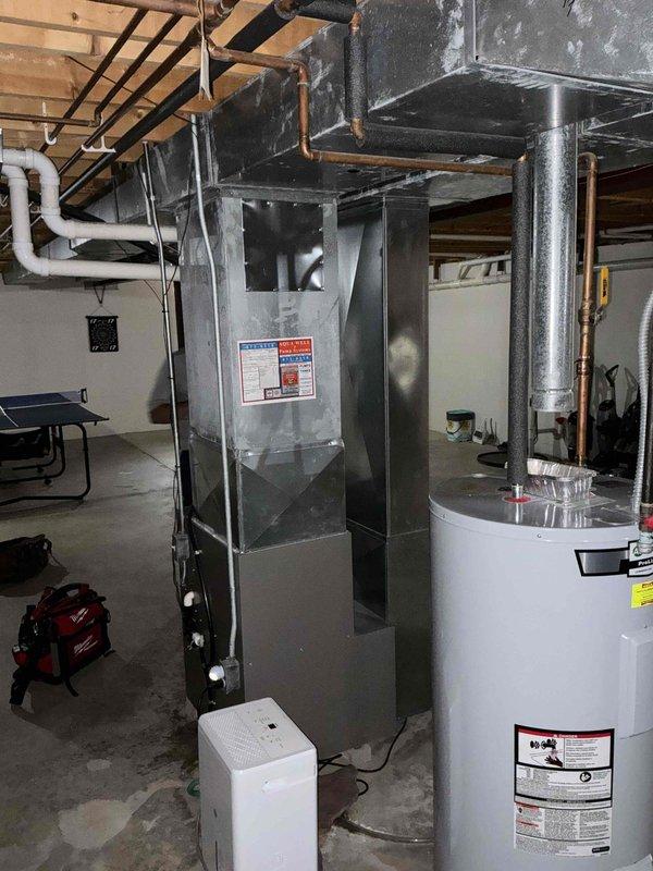 Provided comprehensive estimate for complete air conditioning system replacement on 22-year-old unit currently operating but nearing end of service life. Evaluated existing outdoor condenser unit and indoor furnace configuration in basement to determine appropriate replacement specifications and installation requirements for proactive system upgrade prior to potential failure.