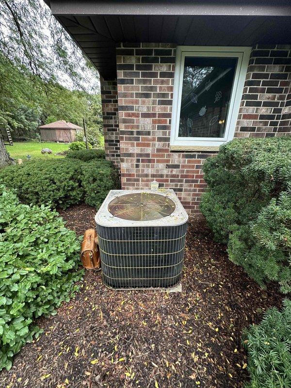 Conducted on-site assessment for residential HVAC system conversion from oil-fired furnace to gas-fired heating equipment. Evaluated existing furnace installation in basement mechanical room, documented current ductwork configuration including pyramid-style plenum system, and assessed exterior condensing unit condition. Provided comprehensive estimate for complete system replacement, noting that natural gas service line installation by utility-approved contractor is prerequisite before furnace conversion can proceed.