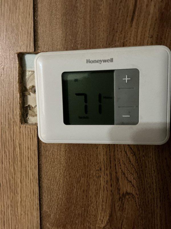 Completed comprehensive furnace tune-up and maintenance service. Inspected control board and electrical components, verified proper operation of all safety controls and ignition system, and replaced air filter as requested. Thermostat confirmed operating correctly at 71°F setpoint with all heating functions responding appropriately.