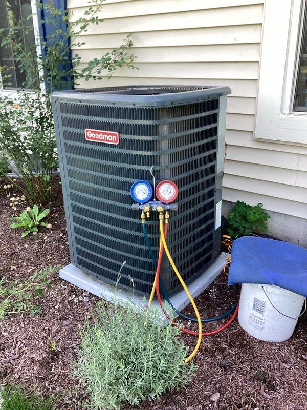 Completed furnace tune-up and performed maintenance on Aprilaire humidifier system, including inspection of water panel filter which showed signs of mineral buildup and reduced efficiency. Discussed humidifier operation and benefits with homeowner, who expressed interest in replacement unit; provided quote for new humidifier installation. Also performed routine maintenance on Goodman outdoor condensing unit, checking refrigerant pressures with manifold gauges and verifying proper system operation.