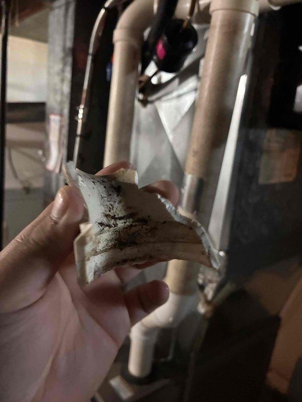 Completed comprehensive tune-up service on commercial furnace and air conditioning system, including replacement of 16x25x4 air filter which showed significant dust accumulation. During inspection, discovered deteriorated insulation material with heavy contamination requiring documentation for follow-up recommendations.