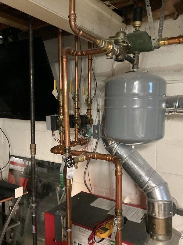 Completed comprehensive heating system maintenance visit as part of annual membership agreement. Performed full furnace tune-up including inspection of all burner assemblies, heat exchangers, and ignition components. Replaced air filter with new 16x25x1 filter as scheduled. Inspected hydronic heating system components including expansion tank, copper piping, brass valves, and associated connections. Verified proper operation of all heating zones and confirmed system pressures within manufacturer specifications. All equipment operating efficiently with no issues found.