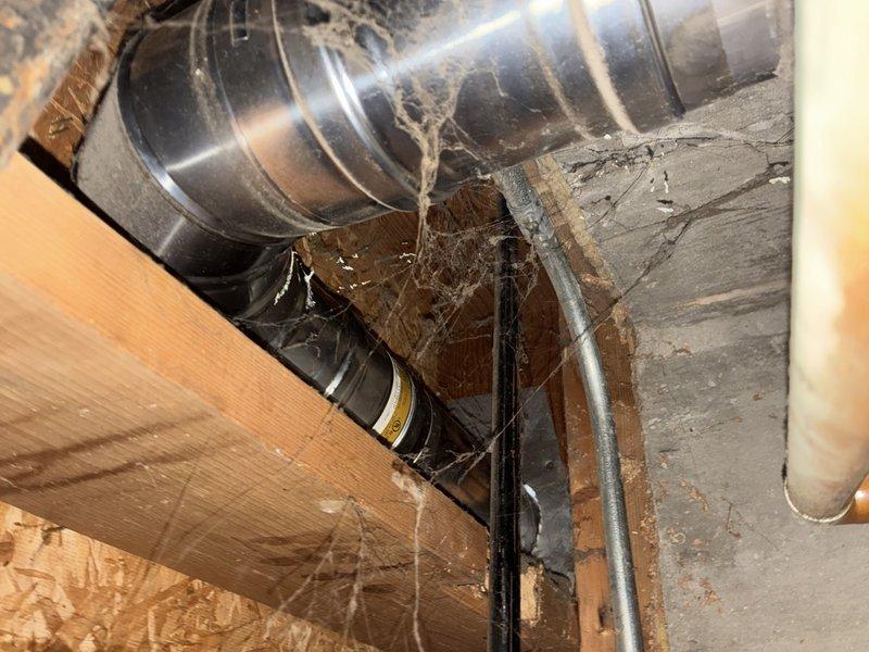 Responded to service call for non-operational water heater. Upon arrival, inspected Rinnai tankless water heating unit and associated plumbing connections. Evaluated system components including copper supply lines, ventilation assembly, and control panel to diagnose malfunction. Customer had previously contacted manufacturer regarding issue and received preliminary assessment identifying potential component failure. Performed diagnostic assessment of unit to determine repairability and provide customer with repair options versus replacement recommendations.