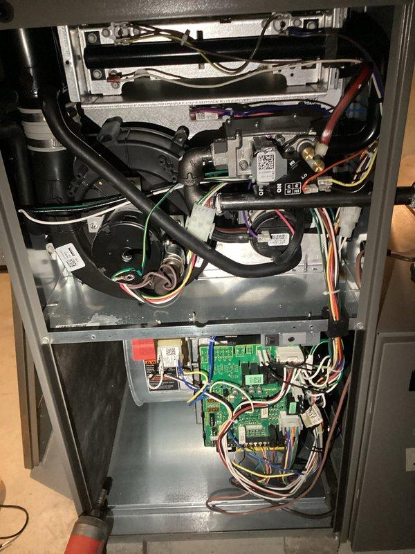 Completed furnace tune-up maintenance service on residential gas furnace unit. Performed comprehensive system inspection including visual examination of blower assembly, burner components, gas valve system, control board, electrical connections, and wiring harnesses. All components found operating within normal parameters with no deficiencies noted at time of service.