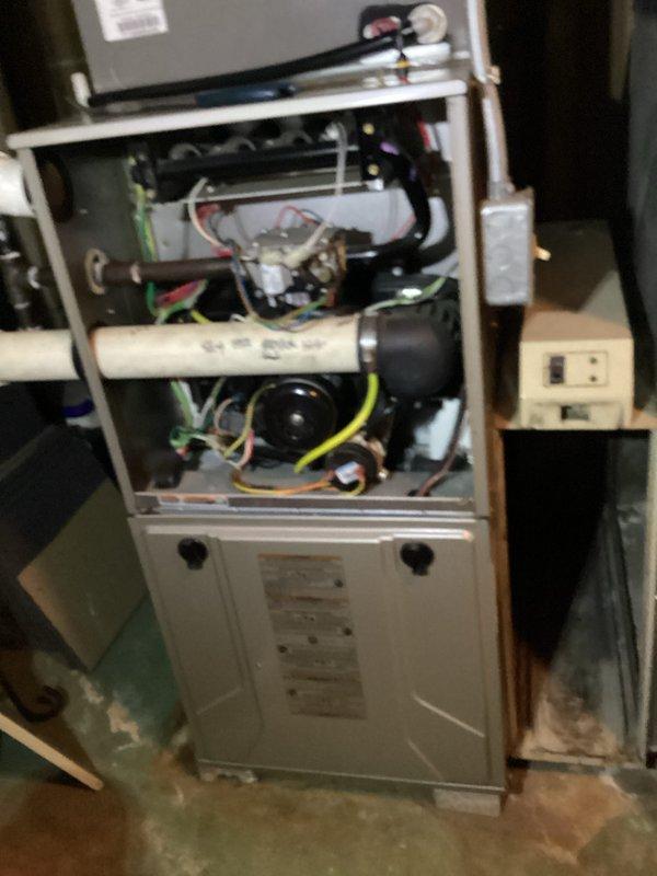 Completed comprehensive furnace and air conditioning tune-up service, performing thorough cleaning and inspection of all system components. Inspected electrical connections, blower motors, and wiring harness; verified proper operation of compressor unit and refrigerant lines. Customer to provide water panel for humidifier system at later time.
