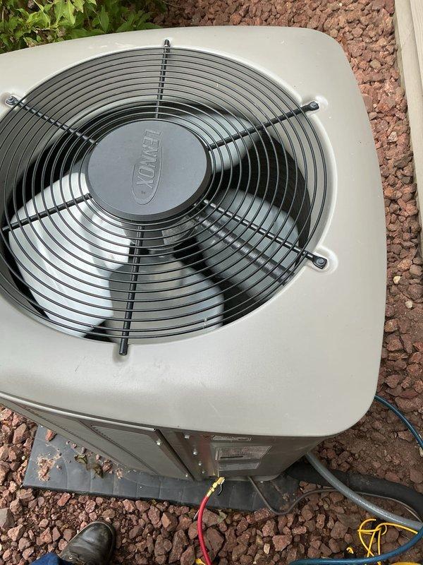 Completed comprehensive A/C tune-up on residential split system with Lennox furnace and outdoor condenser unit. Performed standard maintenance procedures including inspection of both indoor and outdoor components, verified proper operation of fan assembly, checked electrical connections, and ensured system is operating within manufacturer specifications.
