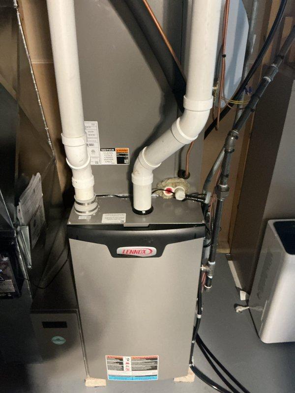 Completed comprehensive A/C tune-up on residential split system with Lennox furnace and outdoor condenser unit. Performed standard maintenance procedures including inspection of both indoor and outdoor components, verified proper operation of fan assembly, checked electrical connections, and ensured system is operating within manufacturer specifications.