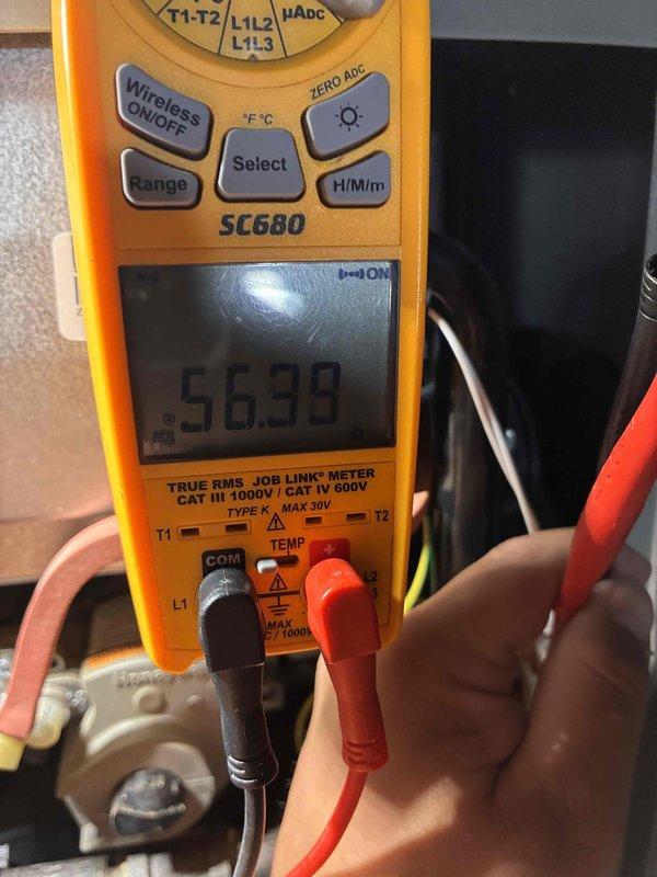 Completed furnace tune-up and safety inspection on residential HVAC system. Performed electrical diagnostics using calibrated multimeter, measuring amperage draw at 0.36A and verifying voltage readings to ensure proper system operation. Conducted temperature differential testing with readings of 56.98°F to confirm adequate heat exchanger performance and airflow. All electrical connections tested and verified within manufacturer specifications, system operating safely and efficiently.