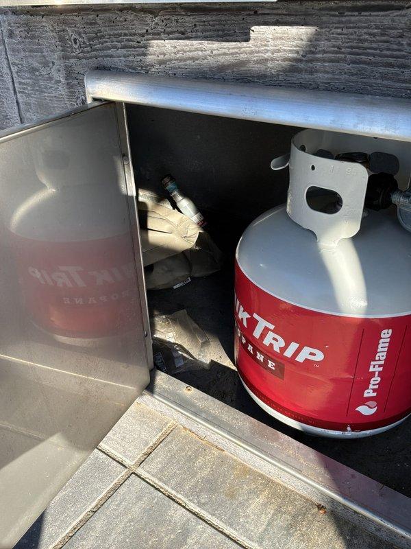 Conducted on-site assessment for natural gas piping installation to accommodate new outdoor grill and fireplace connections. Evaluated existing propane infrastructure stored in deck compartment and inspected rooftop gas line routing, including PVC vent penetrations and equipment locations. Provided comprehensive pricing estimate for required gas line extensions and hookup installations to support both appliances.