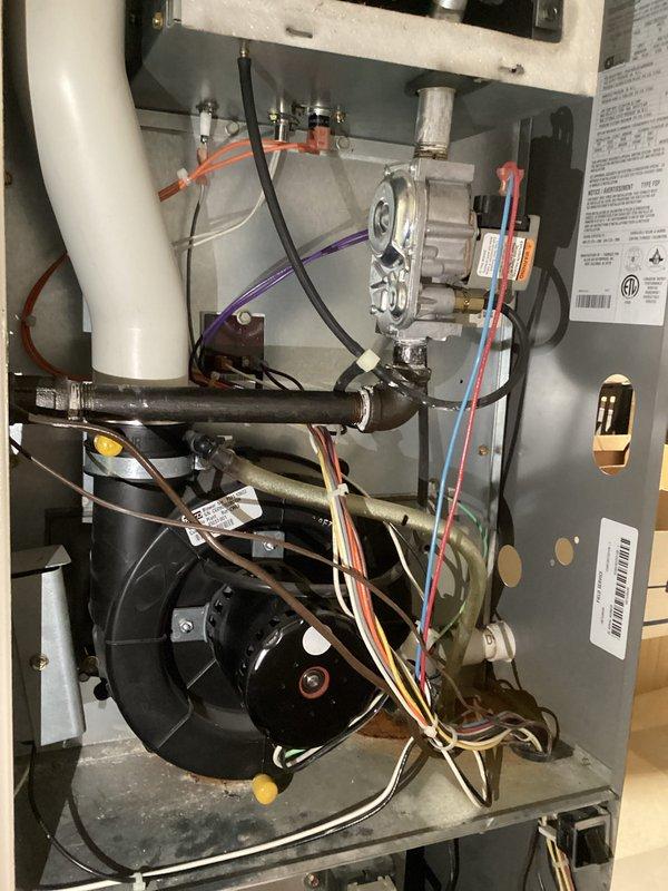 Completed preventive maintenance tune-up on gas furnace system and replaced two Air Bear filters (20x25x5). Performed combustion analysis using digital flue gas analyzer, confirming optimal system performance with stack temperature of 112.6°F, oxygen level at 6.2%, carbon monoxide reading of 5 ppm, and efficiency at 92.6%. All readings within manufacturer specifications, indicating proper burner operation and heat exchanger function.