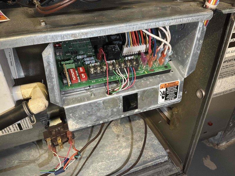 Completed estimate for natural gas furnace replacement located in basement. Assessed existing HVAC control board and gas valve assembly, documented current system configuration including electrical connections and refrigerant lines. Provided replacement options and recommendations for new furnace installation.