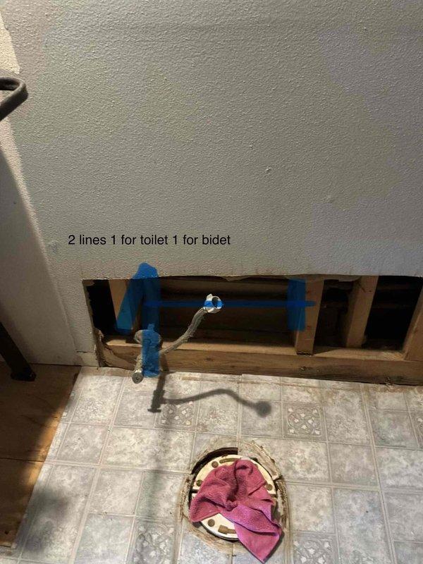 Completed plumbing estimate for bathroom remodel involving installation of dual water supply lines for toilet and bidet fixtures. Assessed existing subfloor conditions and plumbing infrastructure in crawl space area, evaluated wall cavity access for rough-in work, and documented required PVC supply line routing through wooden framing to accommodate new fixture installations.
