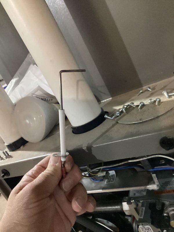 Completed comprehensive furnace tune-up including full system inspection and combustion analysis. Flue gas testing with Testo 310 II analyzer confirmed optimal performance with efficiency at 93.7%, oxygen at 8.8%, carbon monoxide at 11 ppm (19 ppm air-free), and carbon dioxide at 6.84%. Inspected and serviced condensate drain system components, ensuring proper drainage and secure mounting of drain line assembly.