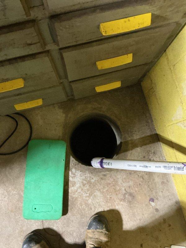 Completed estimate for sump pump replacement with battery backup system installation. Assessed existing sump pump unit showing signs of wear and operational degradation, documented current setup including pump housing, discharge piping configuration, and sump basin condition. Evaluated workspace accessibility and determined requirements for upgraded system with integrated battery backup to ensure continuous operation during power outages. Photographed existing equipment and basin opening to document pre-replacement conditions and provide specifications for replacement unit sizing and installation planning.