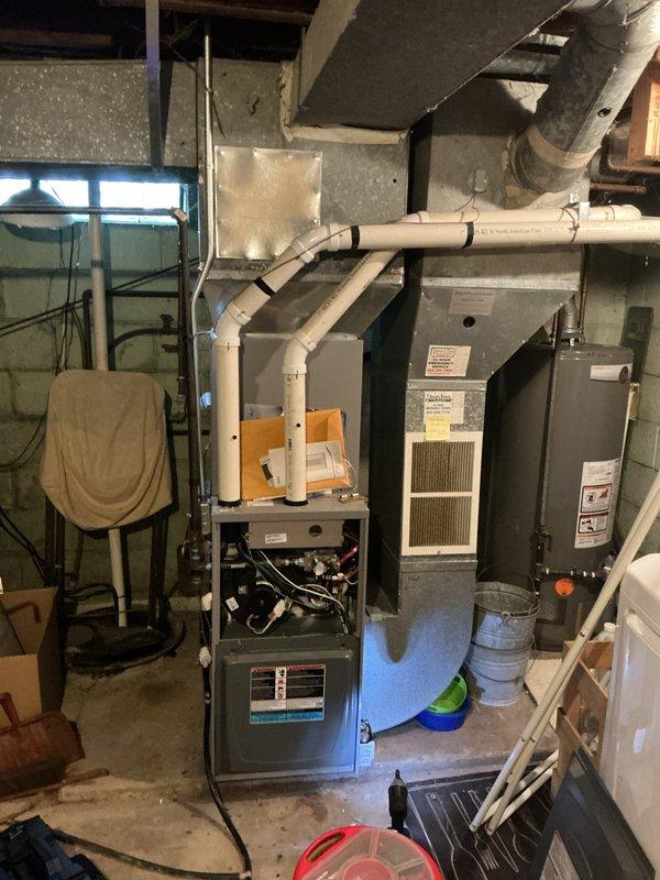 Completed comprehensive tune-up maintenance on two residential furnace systems, one located in the basement and one in the garage attic space. Performed standard maintenance procedures including inspection of all mechanical and electrical components, testing of capacitor functionality using digital multimeter which showed proper readings, verification of ignition system operation, and examination of heat exchanger condition. Replaced air filter media and confirmed proper venting system integrity on both units, with all systems operating within manufacturer specifications upon completion.