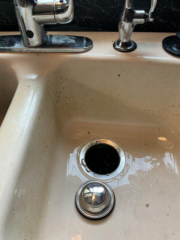 Installed customer-supplied garbage disposal unit under kitchen sink. Completed all necessary plumbing connections, verified proper drainage function, and ensured secure mounting of the disposal unit to the sink assembly.