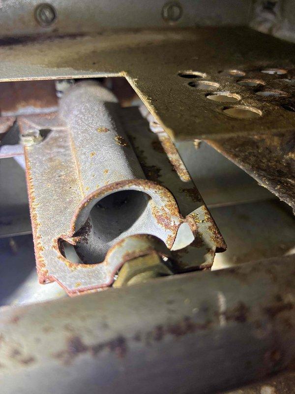 # HVAC Service Report

Responded to service call for non-operational furnace. Upon inspection, discovered extensive rust and corrosion throughout the unit's internal components, including metal brackets, mounting hardware, and housing panels. The evaporator coil sections showed significant deterioration with accumulated debris between aluminum fins and visible compression damage. Metal surfaces exhibited severe oxidation from prolonged moisture exposure, with rust penetration affecting structural integrity of critical components. Documented equipment condition with photographic evidence showing advanced corrosion on mounting brackets, deteriorated painted surfaces, and compromised coil assemblies. Unit condition indicates extended exposure to humidity and moisture, resulting in widespread component degradation that has impacted system functionality.
