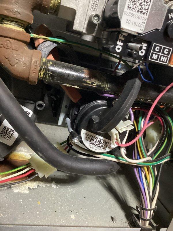 Responded to emergency no-heat call for 8-10 year old furnace system. Upon arrival, performed diagnostic inspection of unit and identified failed ignition sequence preventing burner operation. Inspected flame sensor, pressure switches, and gas valve components showing signs of oxidation and normal wear consistent with unit age. Cleaned corroded flame sensor rod, verified proper voltage to control board, and tested all safety switches for continuity. Cycled system multiple times to confirm successful ignition and proper operation of all heating components. Unit restored to full operational status with normal heating cycle established.