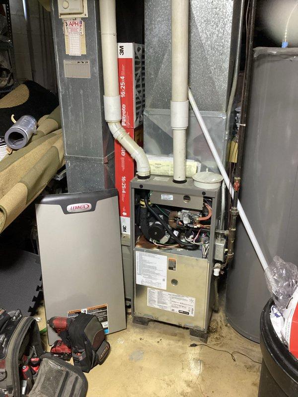 Responded to emergency no-heat call for 8-10 year old furnace system. Upon arrival, performed diagnostic inspection of unit and identified failed ignition sequence preventing burner operation. Inspected flame sensor, pressure switches, and gas valve components showing signs of oxidation and normal wear consistent with unit age. Cleaned corroded flame sensor rod, verified proper voltage to control board, and tested all safety switches for continuity. Cycled system multiple times to confirm successful ignition and proper operation of all heating components. Unit restored to full operational status with normal heating cycle established.