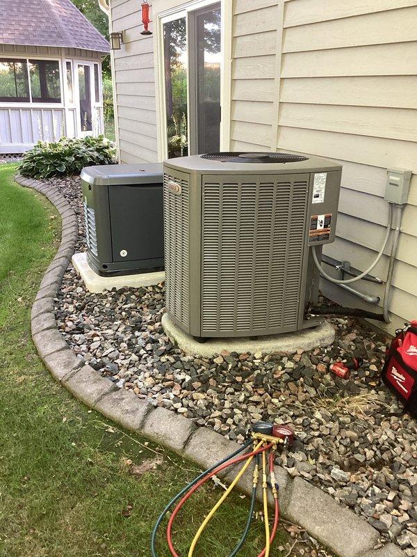 Completed comprehensive furnace and air conditioning tune-up service at residential property. Performed standard maintenance procedures on outdoor condensing unit, including refrigerant pressure testing using manifold gauges to verify proper system charge levels and operational efficiency. All equipment inspected and system operating within manufacturer specifications upon completion.